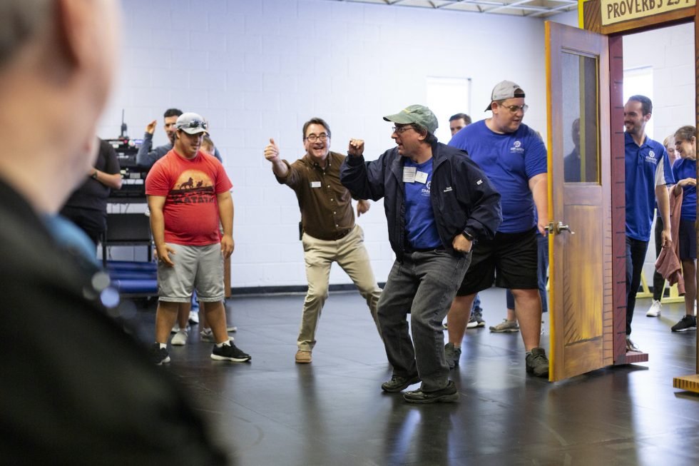 Craig Price of The Naples Players teaches an improv course for the STARability Foundation participants.